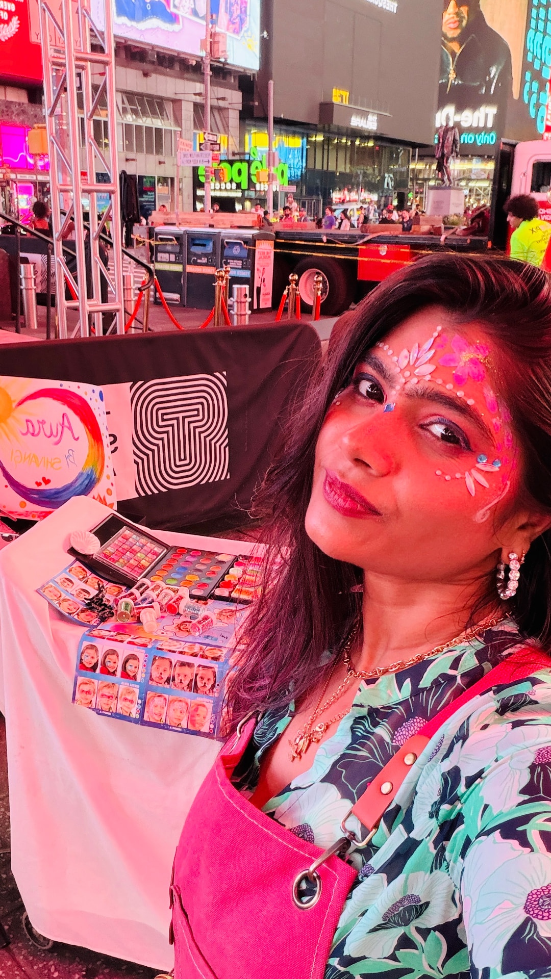 Shivangi offering face painting in Times Square with her art setup